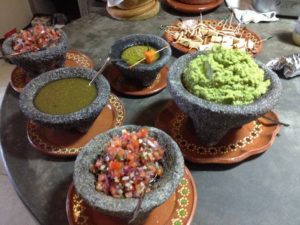 Appetizers with Guacamole, fresh Salsas and Corn Chips